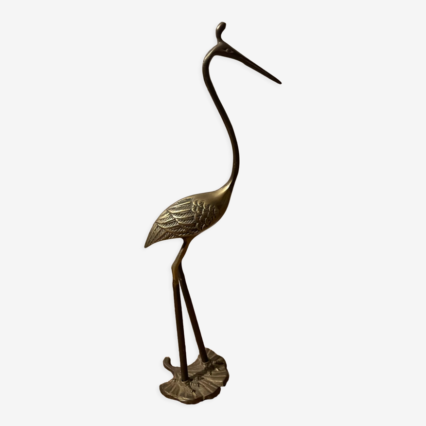 Heron statuette in vintage golden brass year