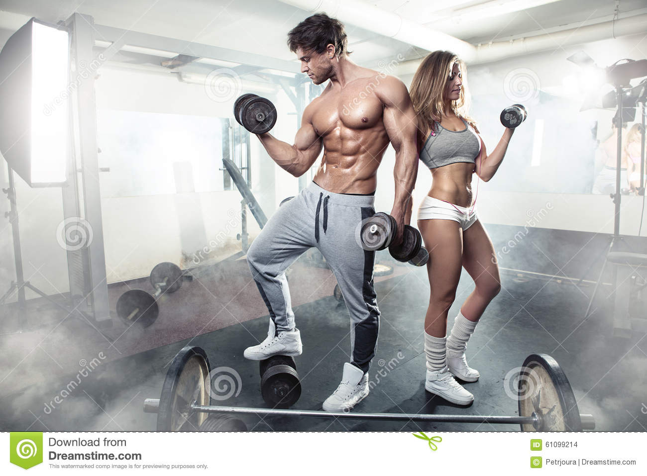 Fit Couple Posing in Gym Stock Photo - Alamy