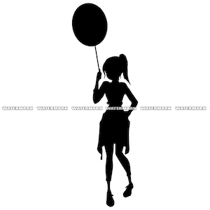 Girl holding balloon