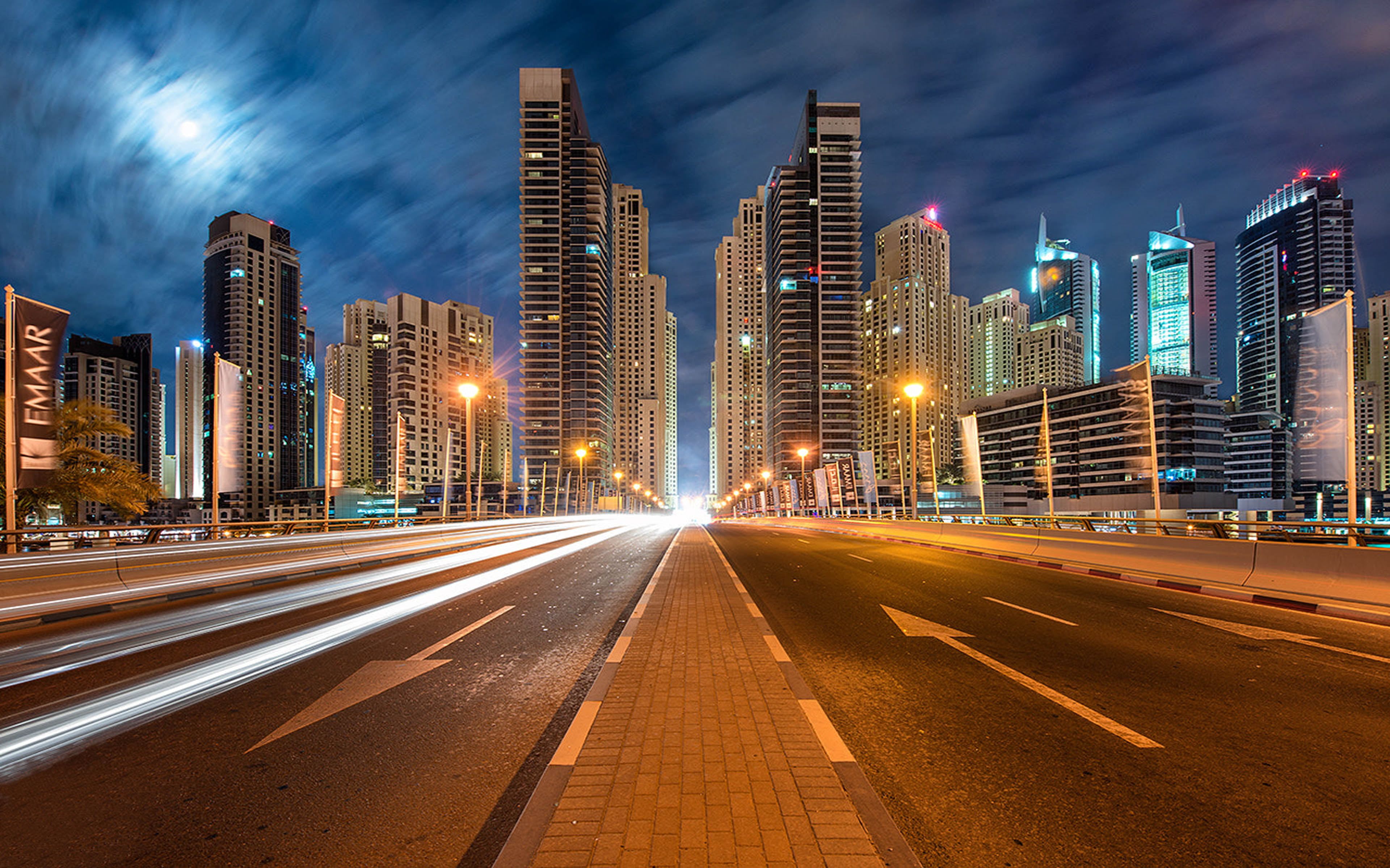 Dubai united arab emirates cityscape with illuminated skyscrapers highway in the night hours ultra hd wallpapers for desâ cityscape hd wallpaper night landscape