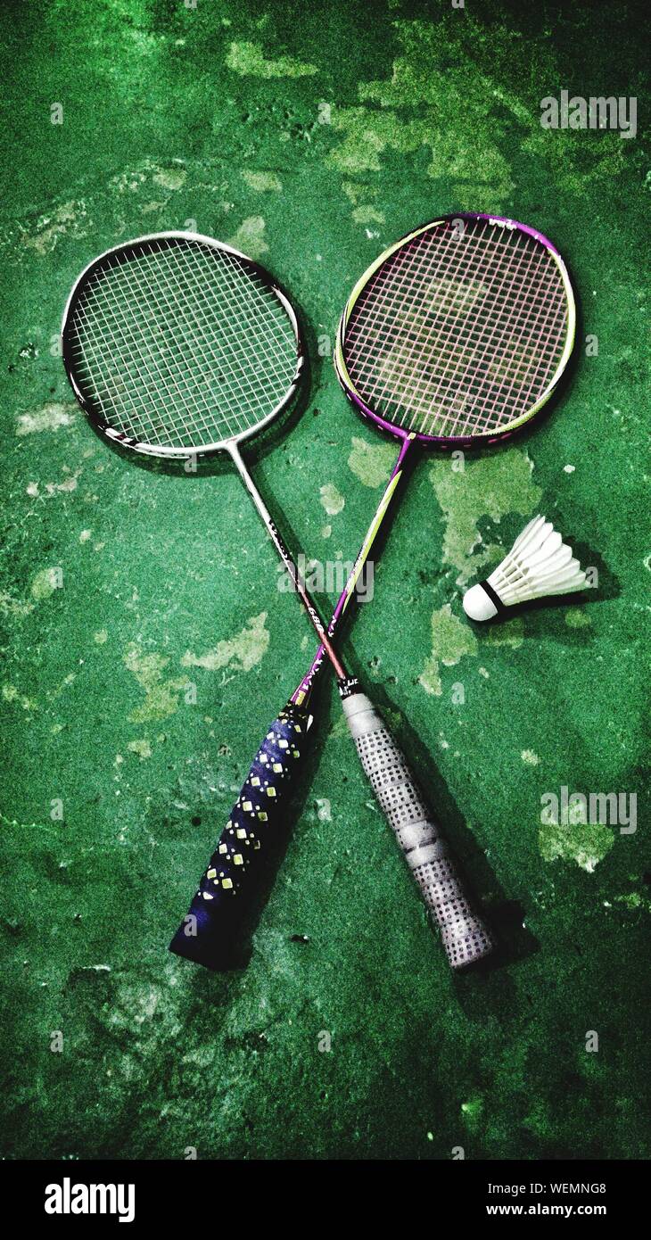 High angle view of badminton rackets with shuttlecock stock photo