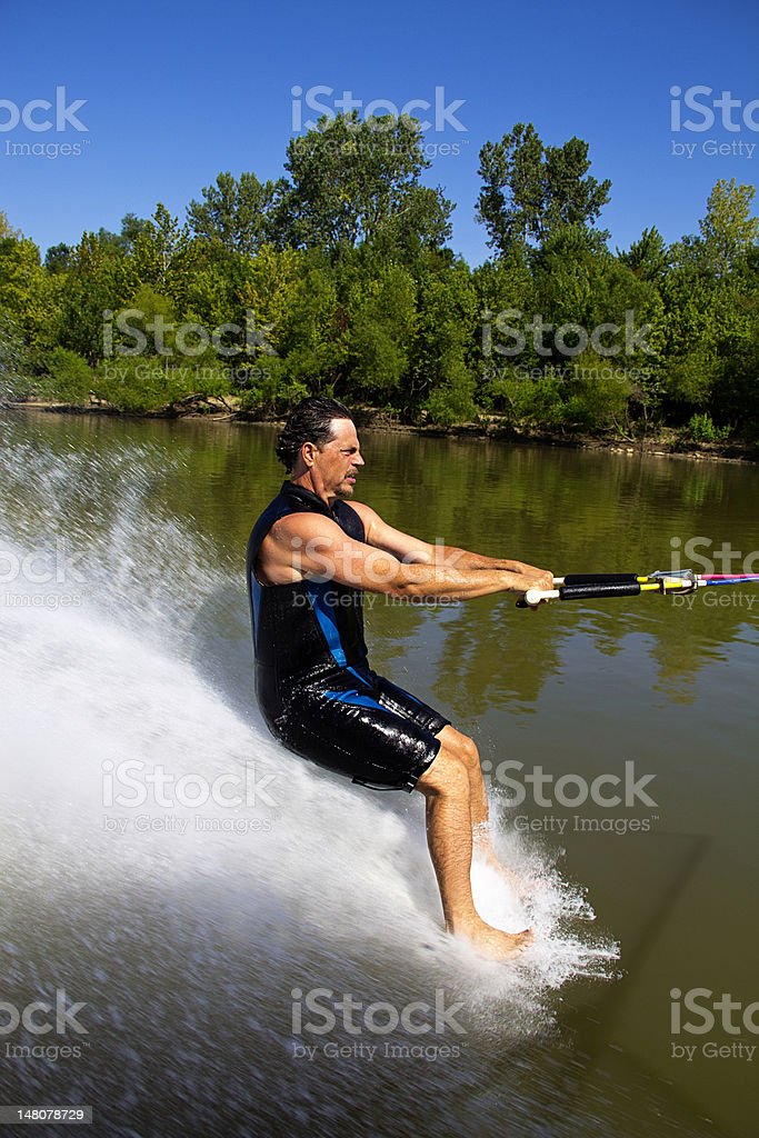 Barefoot water skier stock photo