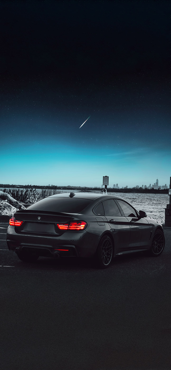 Black bmw on a dark night wallpaper