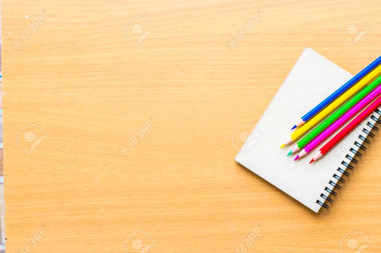 Notepad with pencil on wood board background using wallpaper or background for education business photo take note of the product for book with paper and concept or copy space stock photo picture