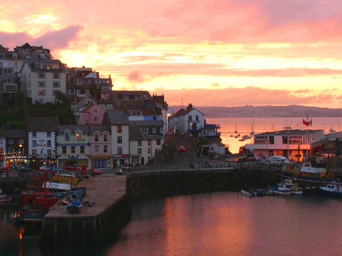 Early evening at brixham harbour in devon by richard pittuck at