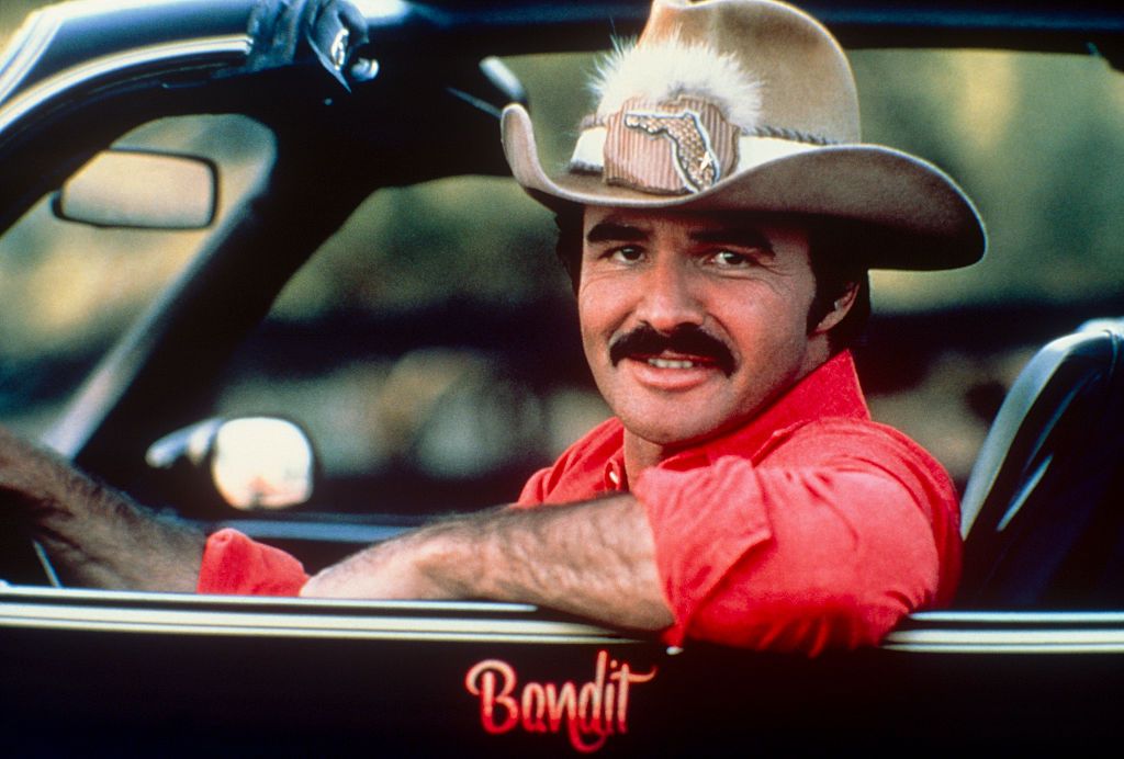 Here are a bunch of photos of burt reynolds looking cool as hell