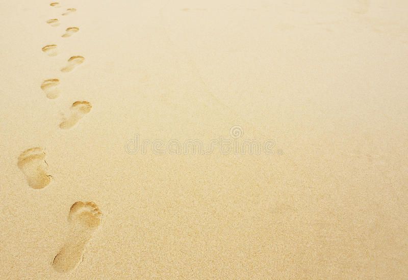 Footprints in the sand background great for vacation or holiday adverts ad background sand footprints greâ background stock images stock images free