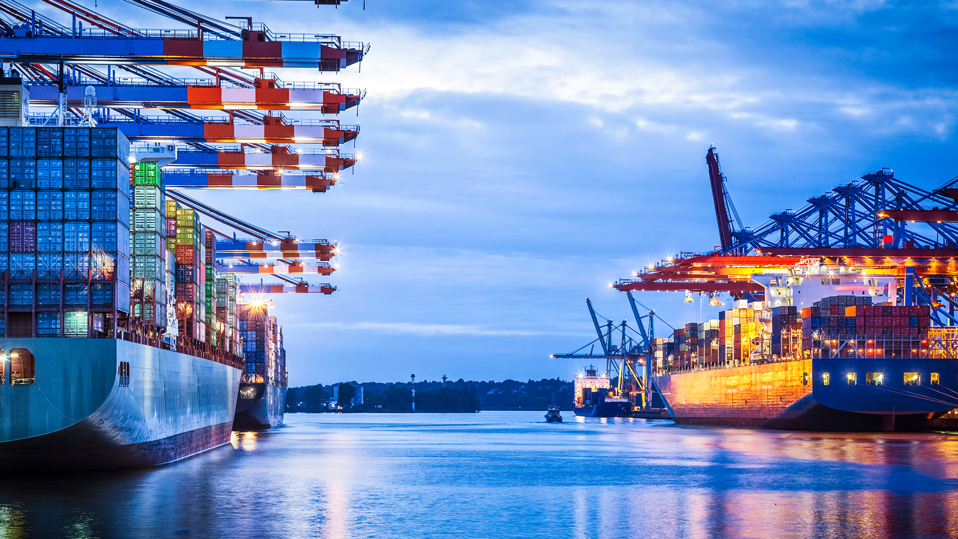 Container terminal with huge container cargo ship ready for unloading hamburg germany windows spotlight images