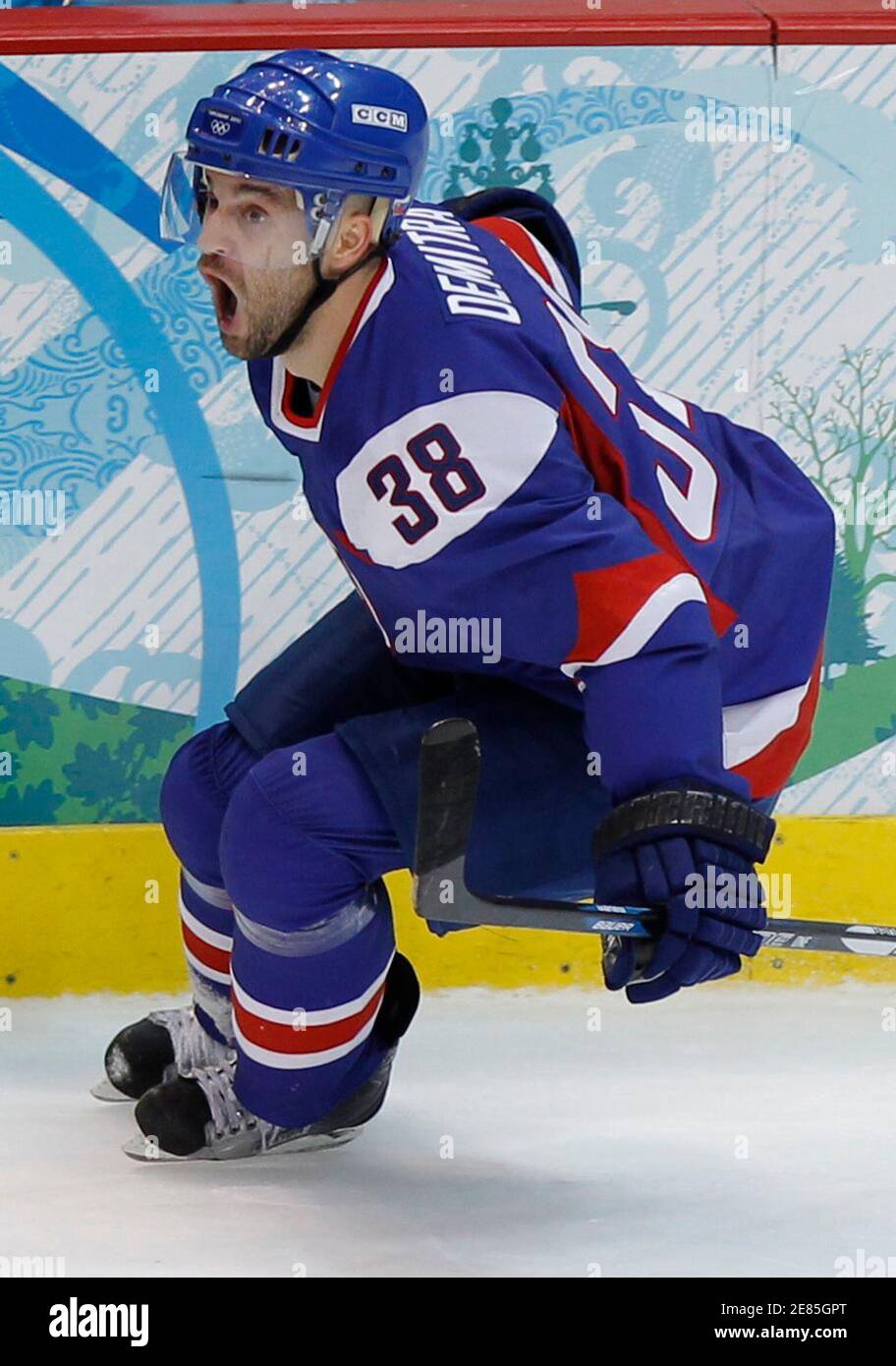 Slovakias pavol demitra celebrates after scoring the third goal against finland during the second period of their mens ice hockey bronze medal game at the vancouver winter olympics february