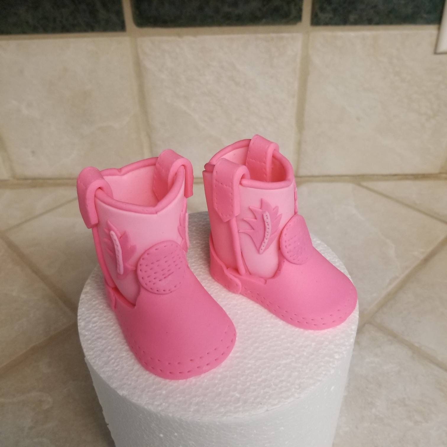 Handmade fondant baby cowboy boots cake topper