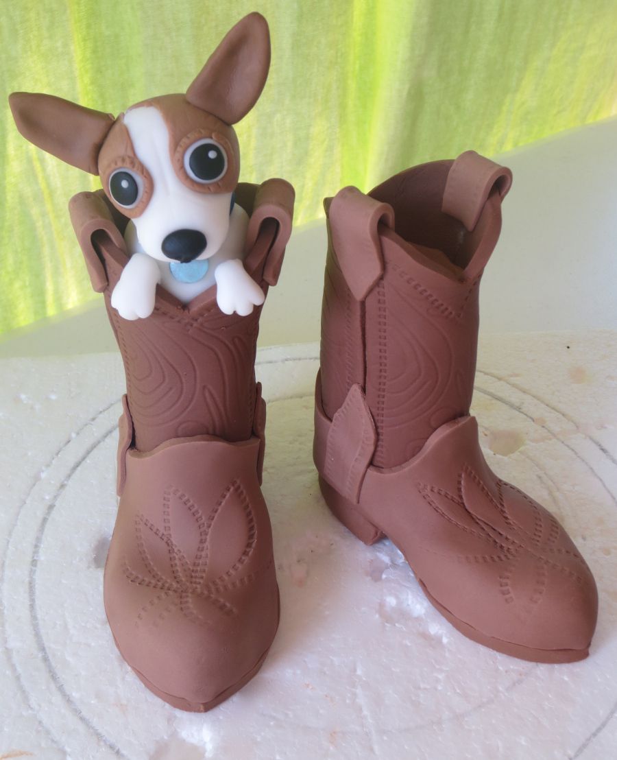 Fondant cowboy boots with dog inside cowboy boot cake fondant dog dog cakes