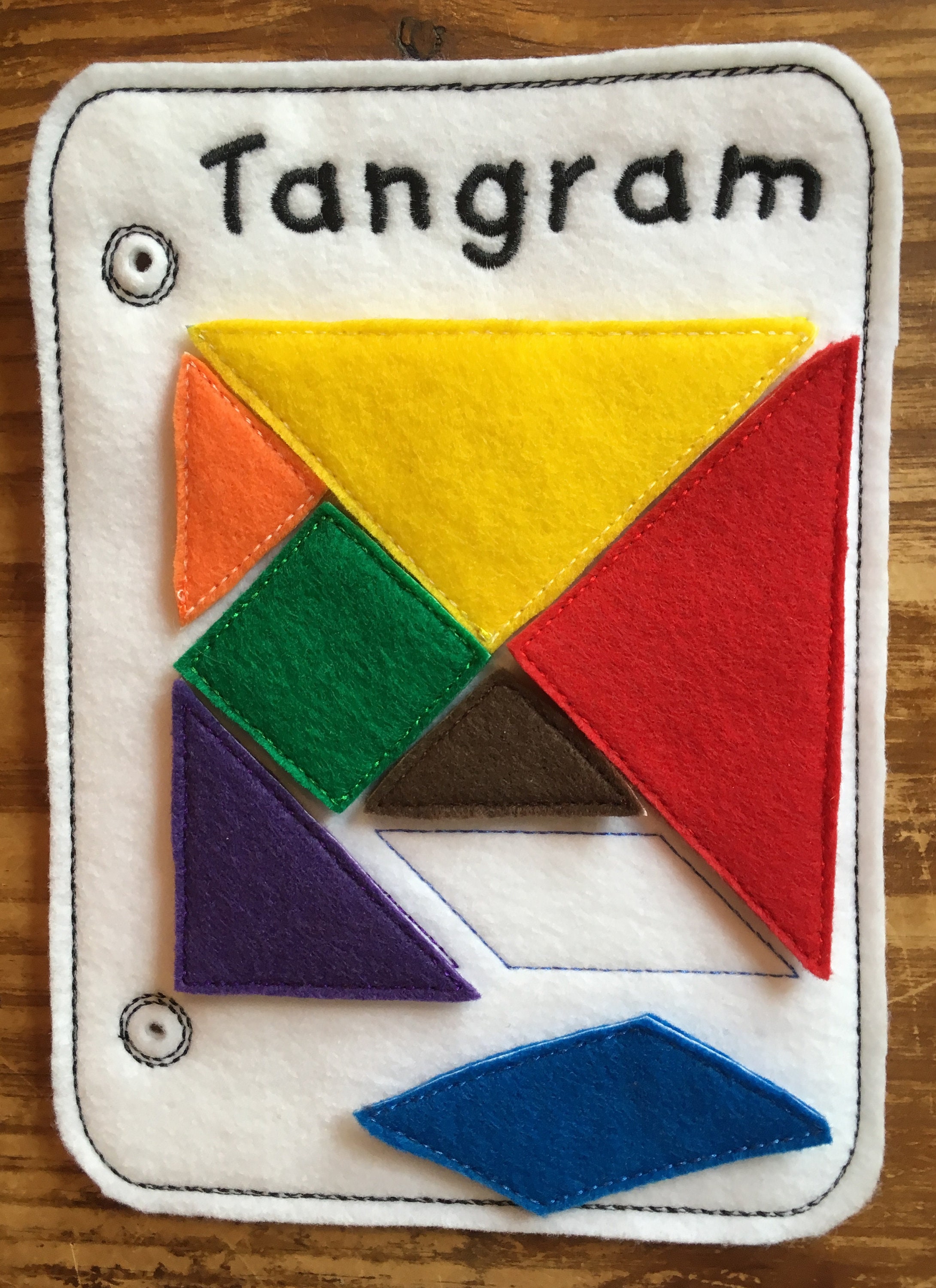 Child gift tangram puzzle busy book page color shape match