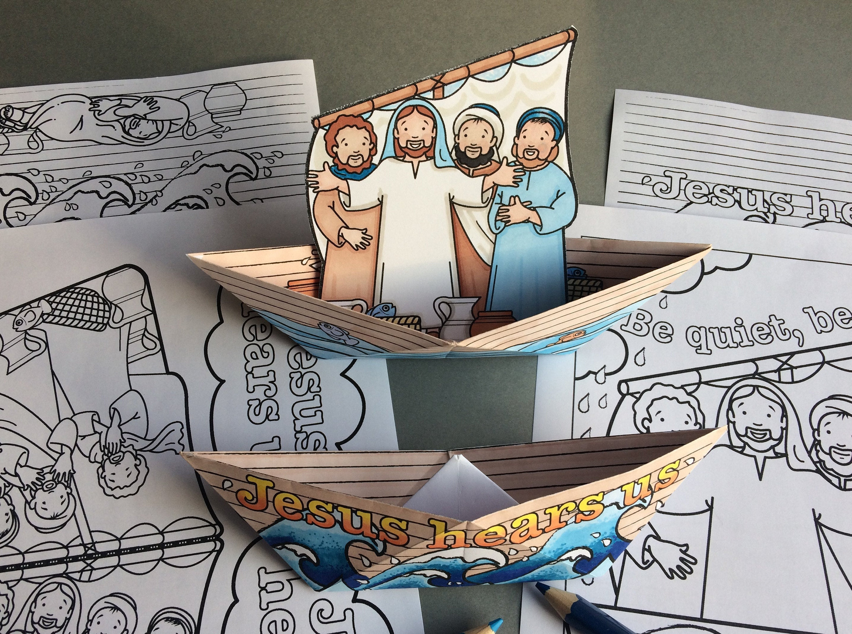 Jesus calms the storm two folded paper boatsmobile to colour in and make with colouring page from the bible story in mark