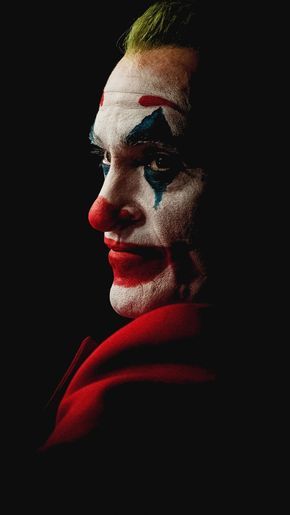 Joaquin phoenix joker black background k ultra hd mobile wallpaper joker wallpapers joker hd wallpaper joker iphone wallpaper