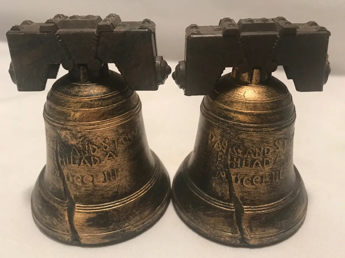 Unused vintage liberty bell salt and pepper shakers made in hong kong excellent