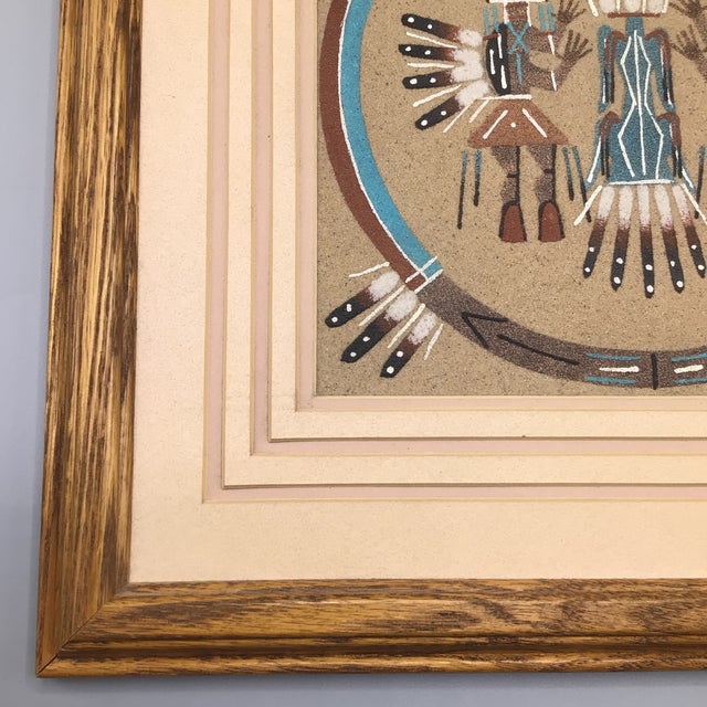 Vintage framed navajo sun sand painting with camel and rainbow people