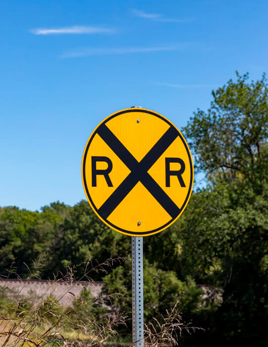 Railroad crossing sign what does it mean