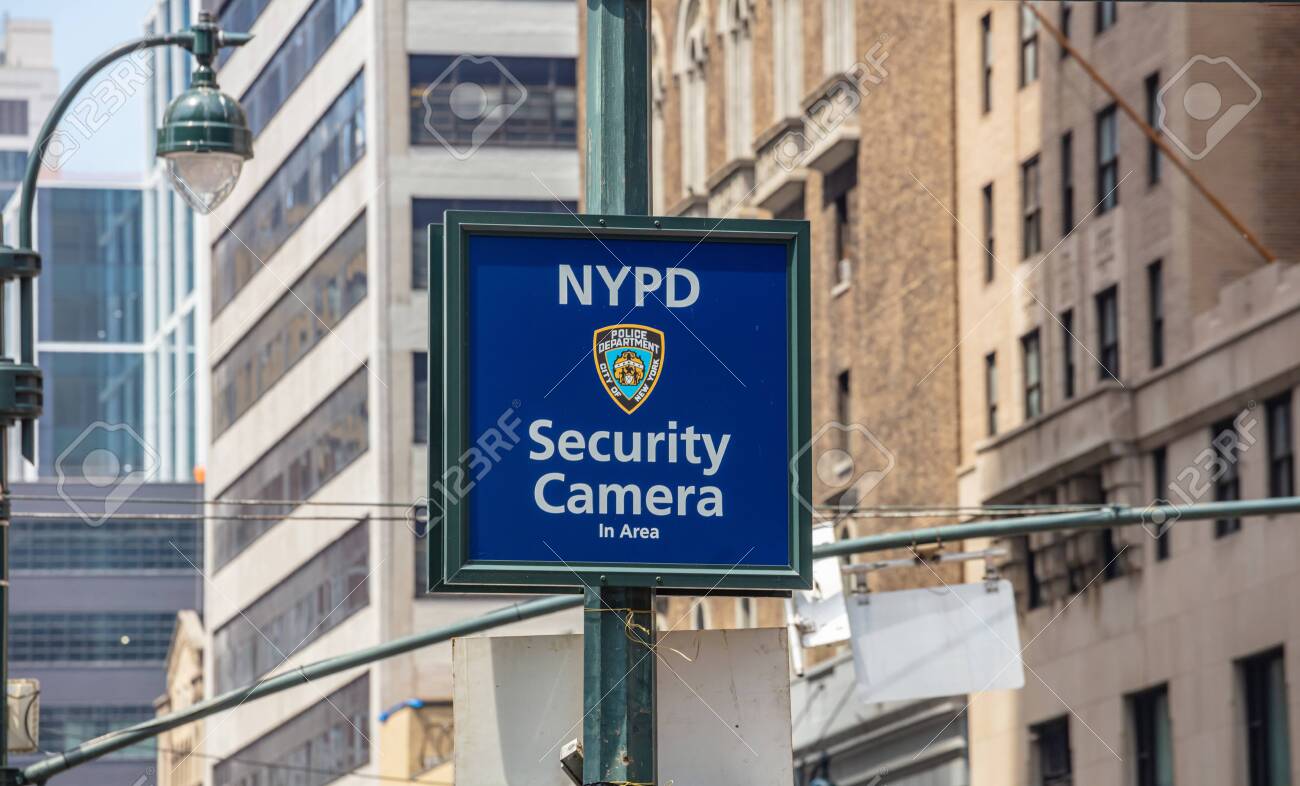 New york usa may no parking no standing red color sign on metal pole blur office buildings background manhattan downtown stock photo picture and royalty free image image