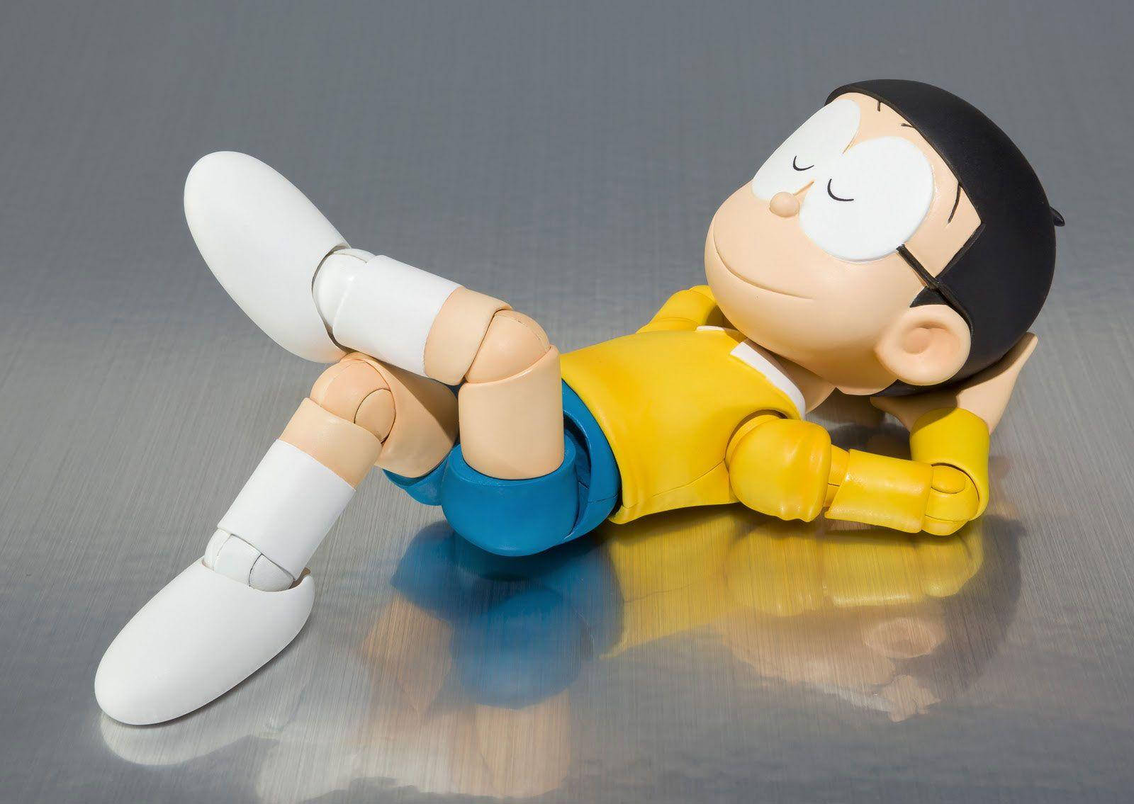 Download cute nobita sleeping on reflective floor wallpaper