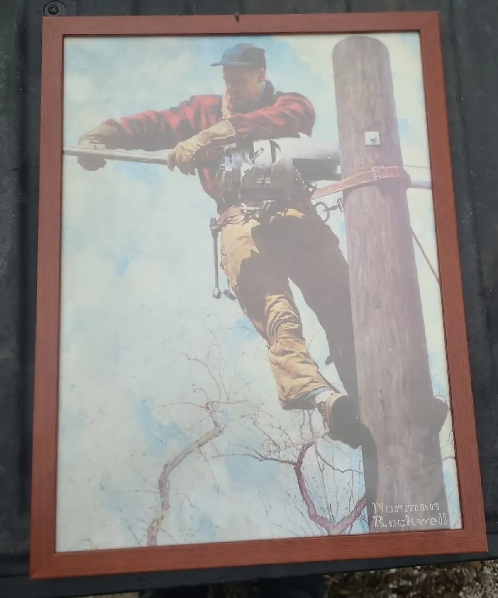 Norman rockwell pic of lineman on pole framed