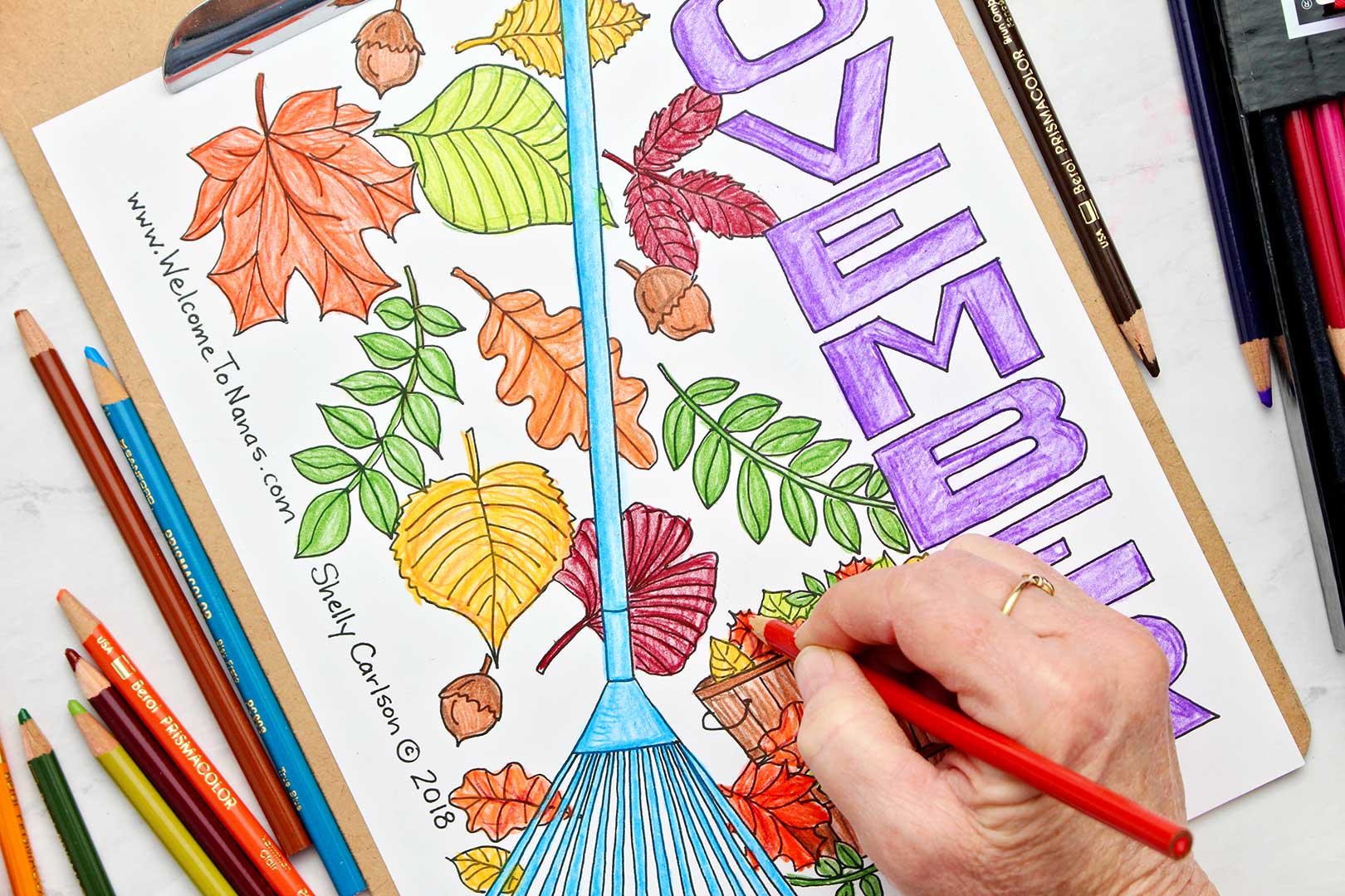 Raking up leaves november coloring page