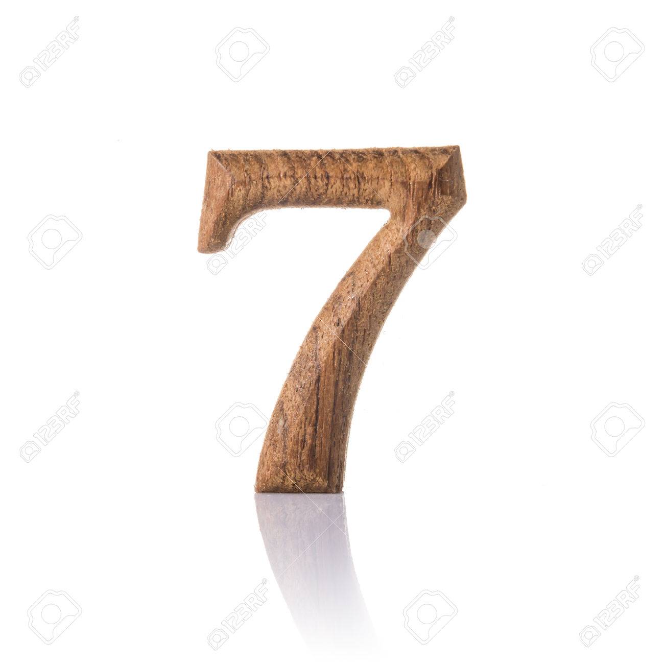 Wooden numeric with shadow isolated on white background number seven stock photo picture and royalty free image image