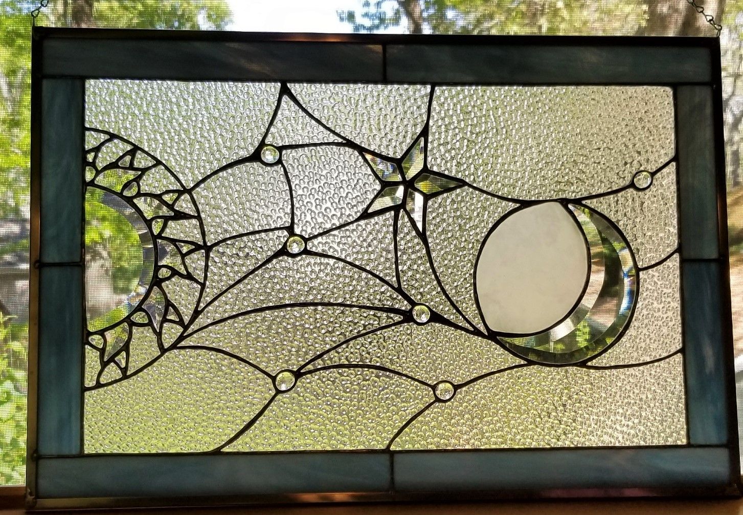 Custom sun moon and stars stained glass window by windflower design