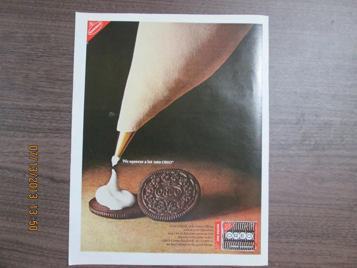 Oreo cookie full page color magazine ad we squeeze a lot into an oreo