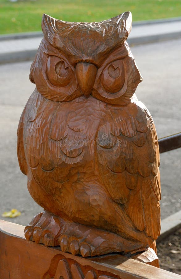 Wood carving owl stock photos