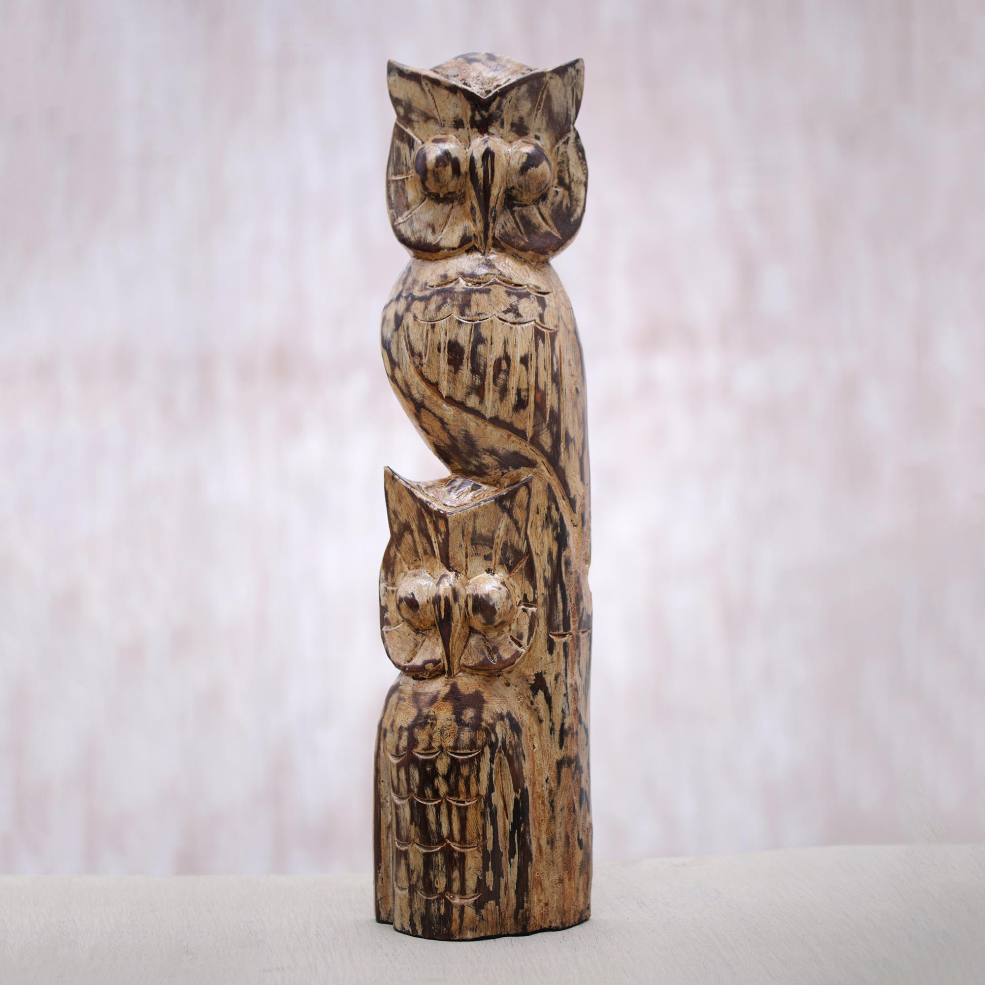 Hand carved albesia wood owl totem statuette from bali