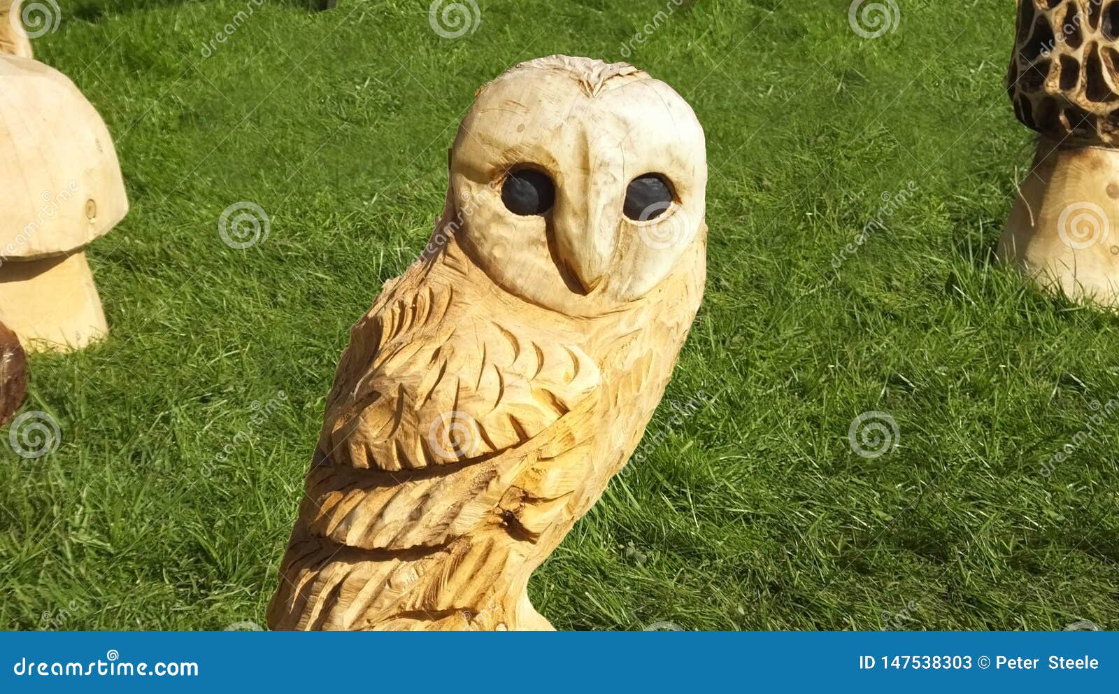 Wood carving owl stock photos