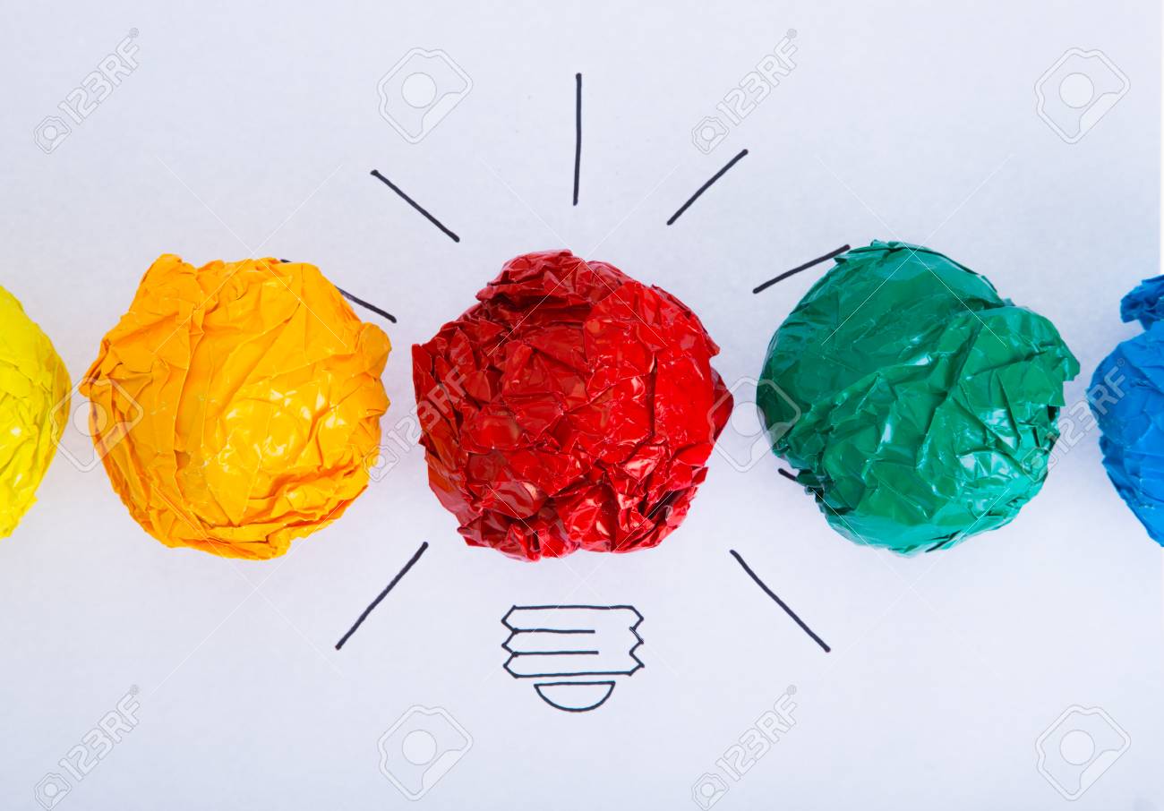 Inspiration concept crumpled color paper light bulb metaphor for good idea stock photo picture and royalty free image image