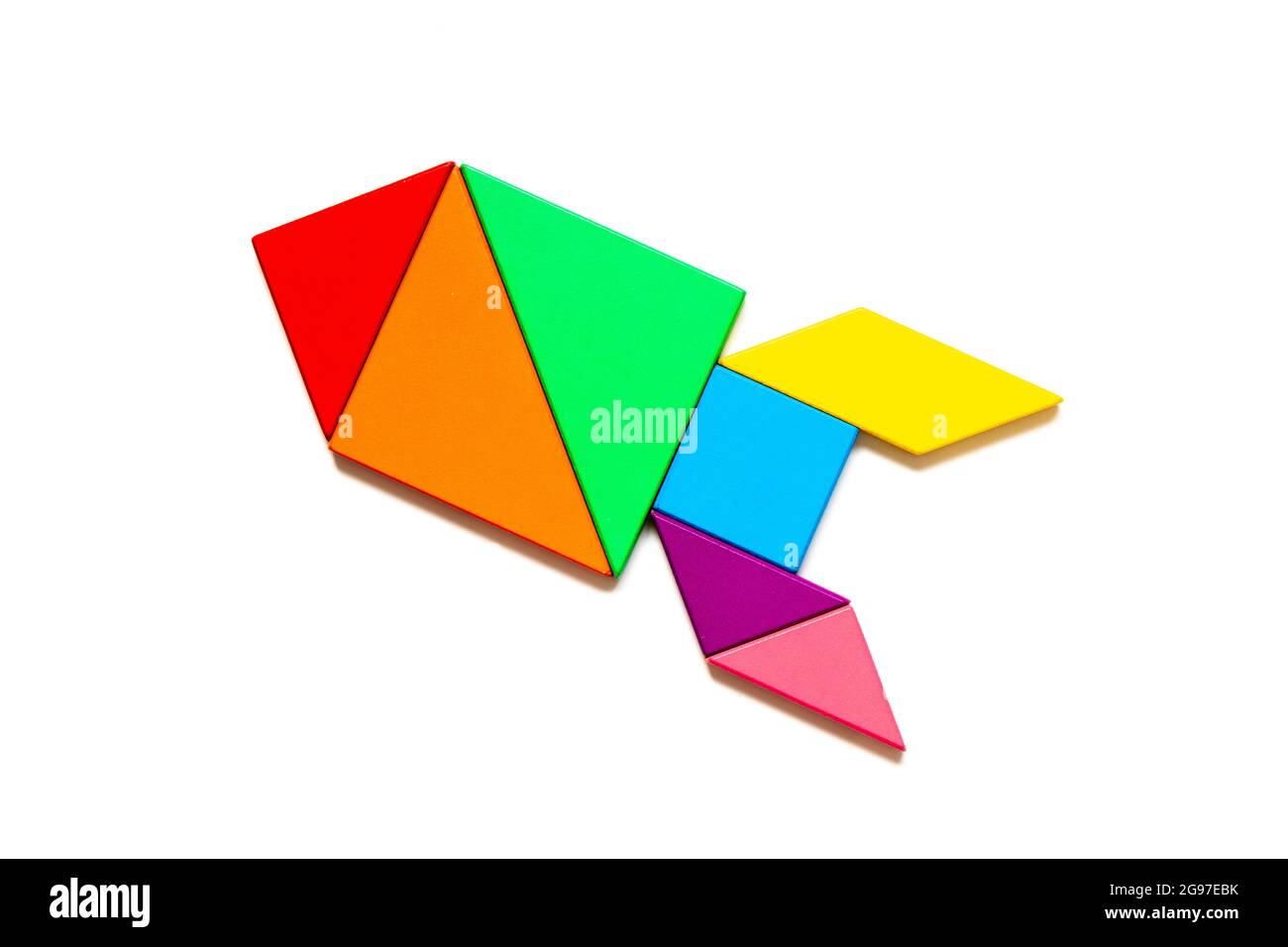 Color tangram puzzle in shape rocket or missile on white background stock photo