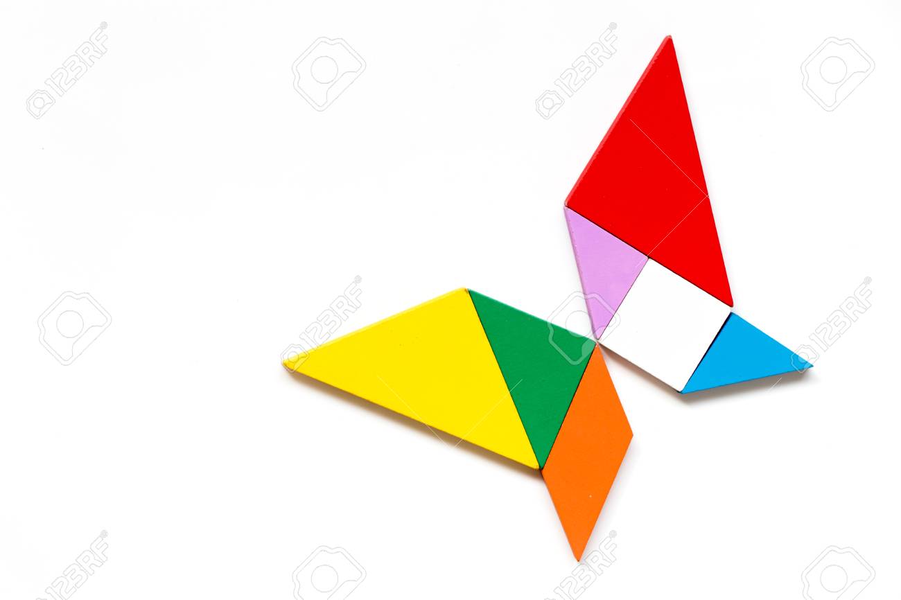 Color wood tangram puzzle in butterfly shape on white background stock photo picture and royalty free image image