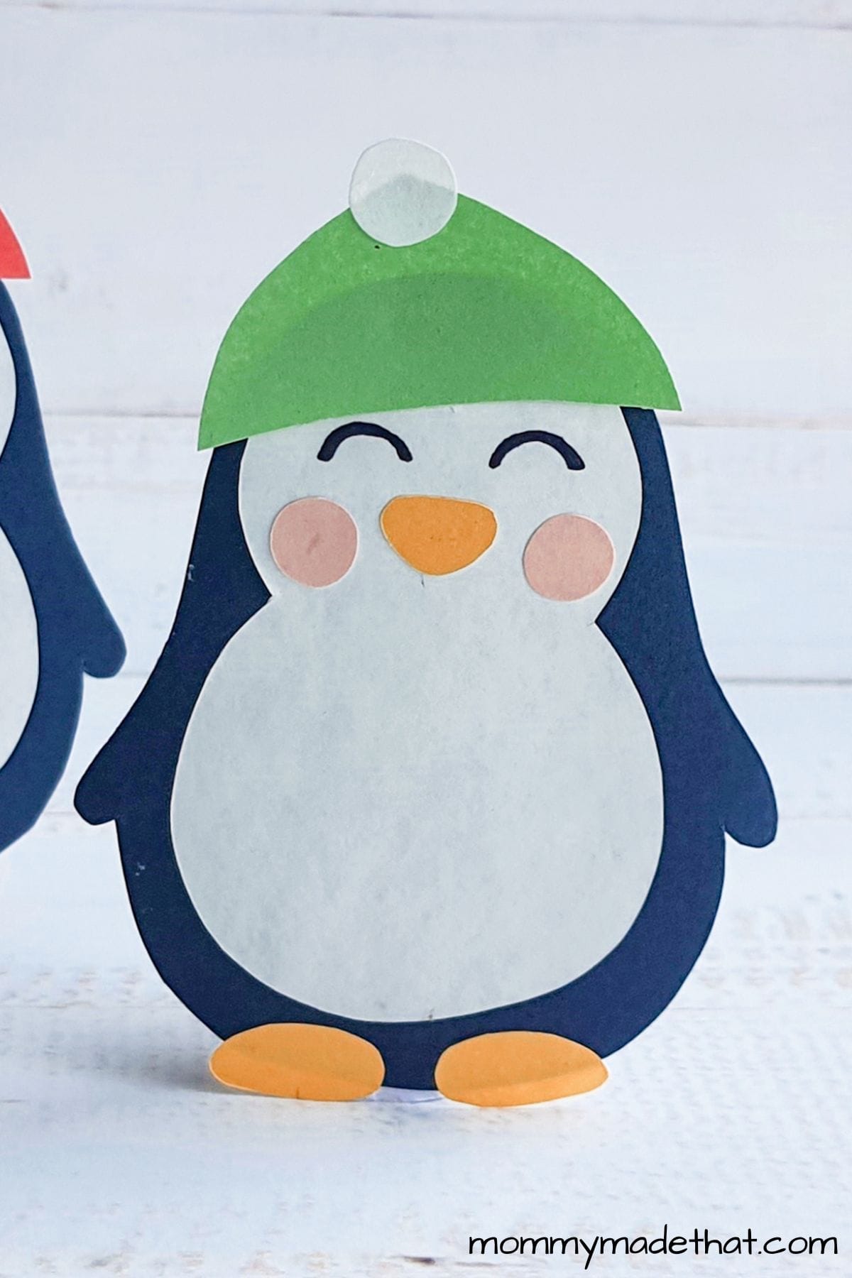 Paper penguin craft with free printable template