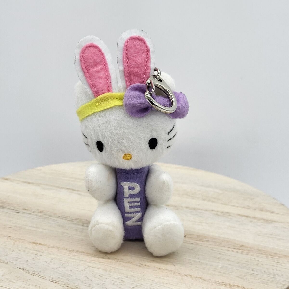 Hello kitty plush pez dispenser keychain easter bunny ears purple sanrio