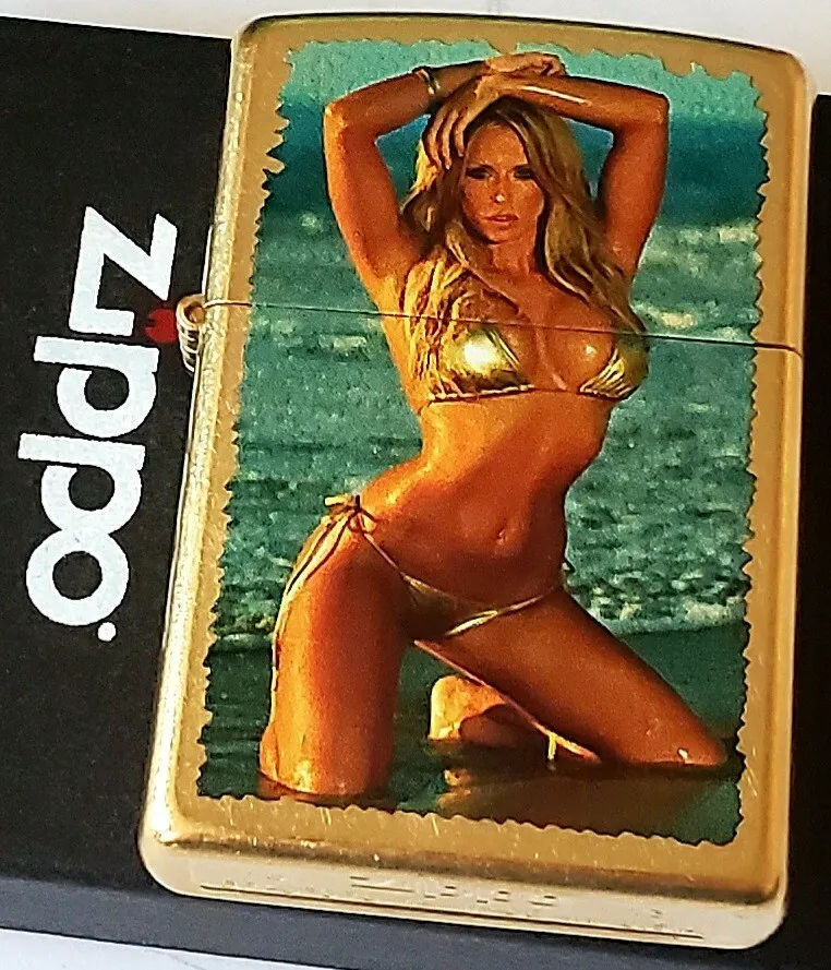 Zippo pinup girl gold bikini on gold dust color case discontinued rare sexy