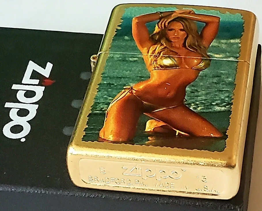 Zippo pinup girl gold bikini on gold dust color case discontinued rare sexy