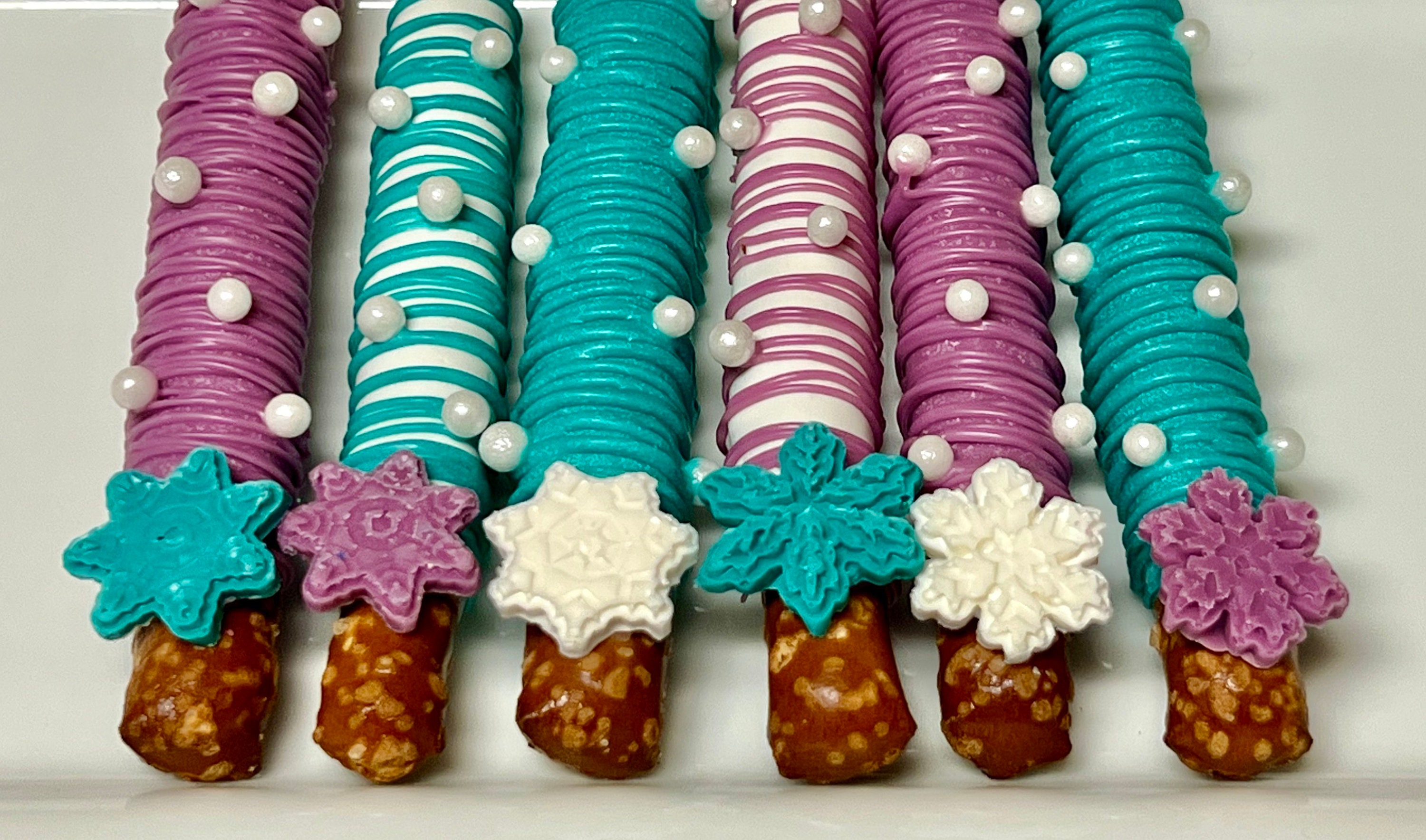 Winter wonderland snowflake princess pretzel rods chocolate covered birthday party favor shower treat table dozen