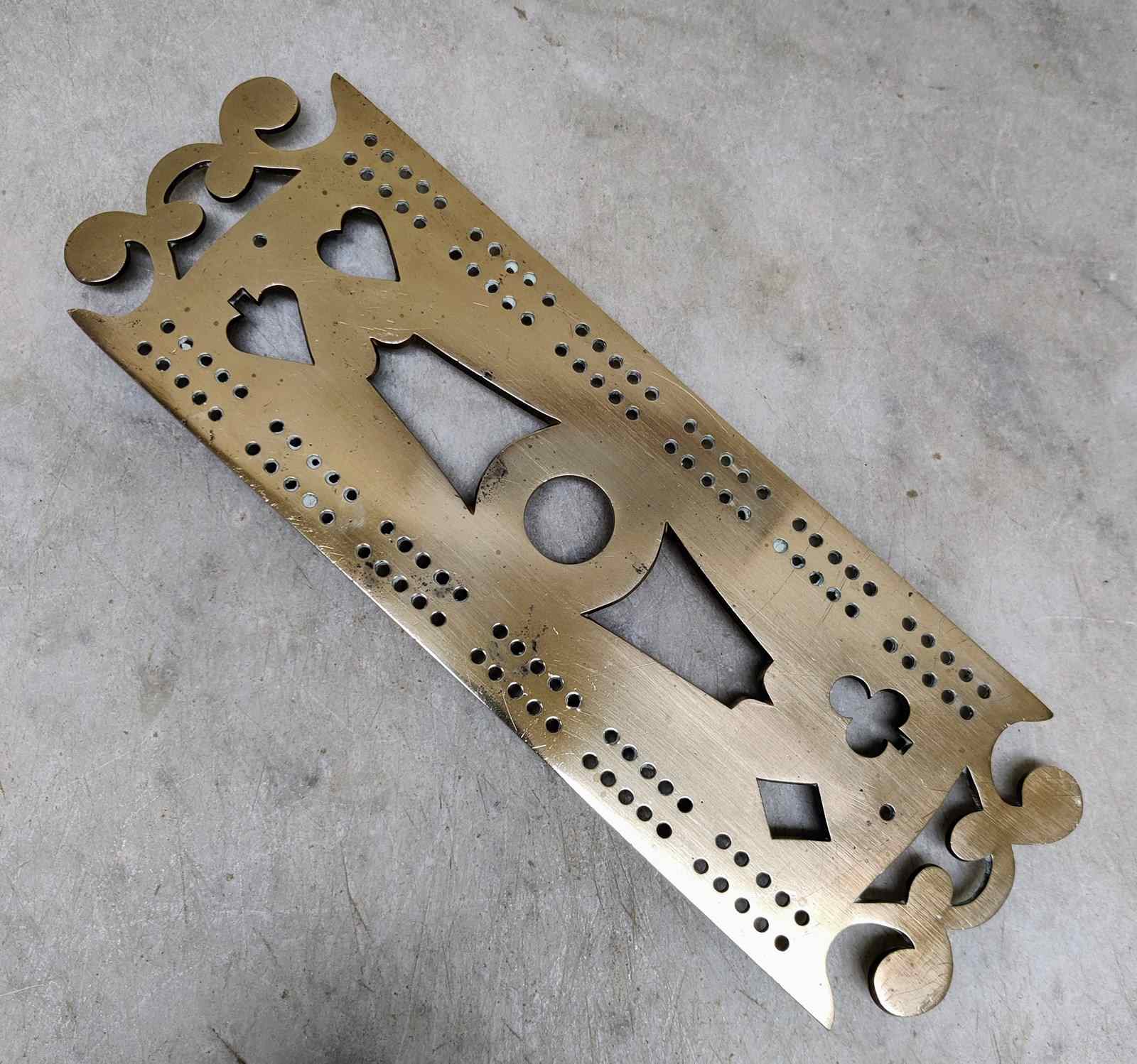 Th century brass cribbage board