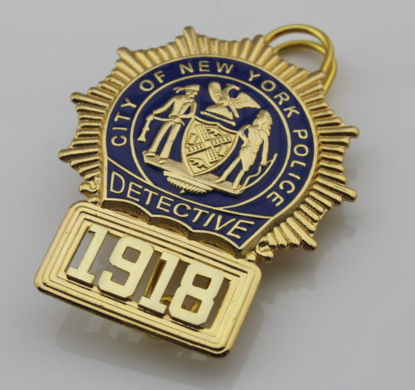 The new york police department nypd detective police badge â