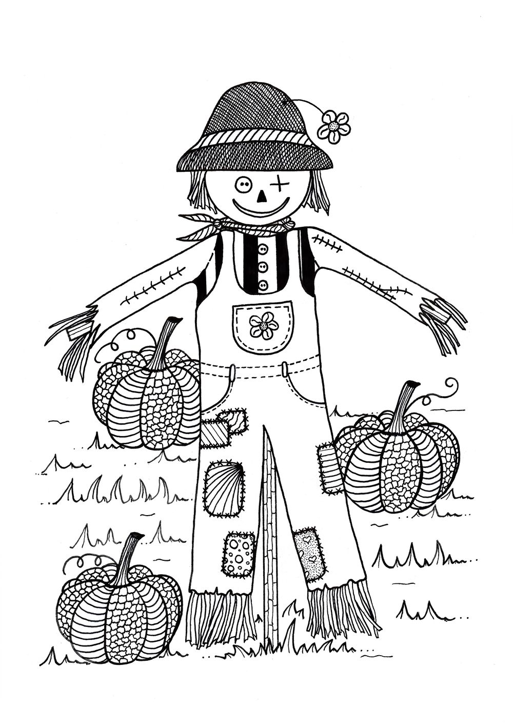 Colorful scarecrow in a vibrant pumpkin field