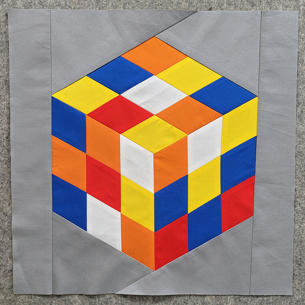 Puzzle cube quilt block