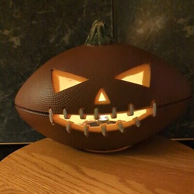 Halloween football shaped pumpkin jack