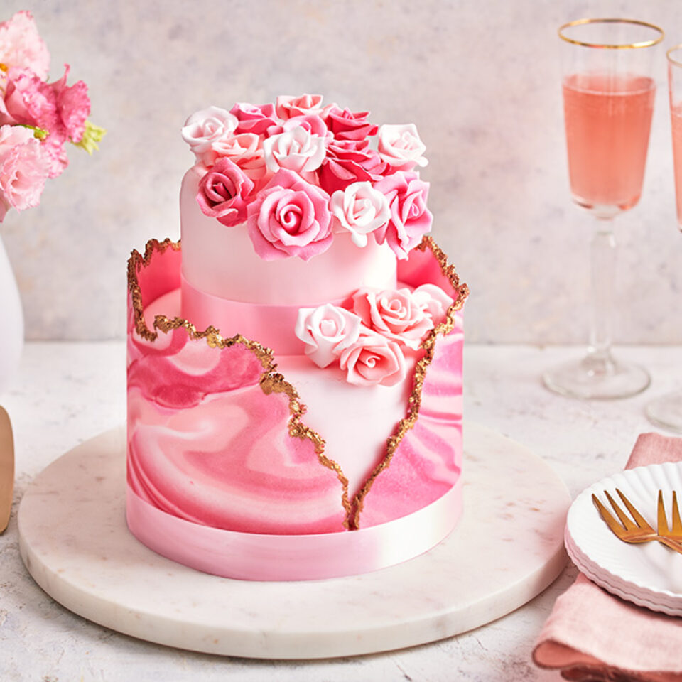 Pink cake with roses and gold edge