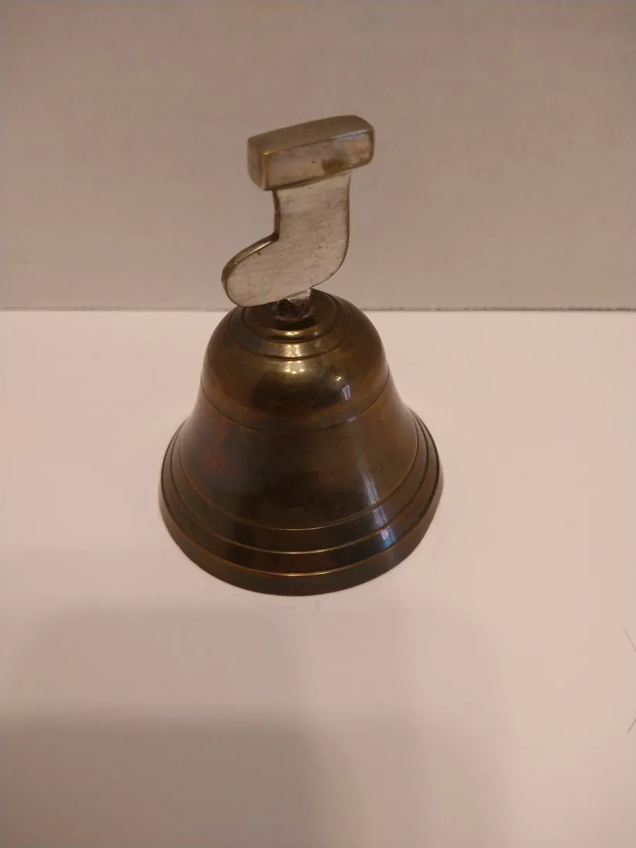 Vintage brass and silver bell with santa boot stocking handle