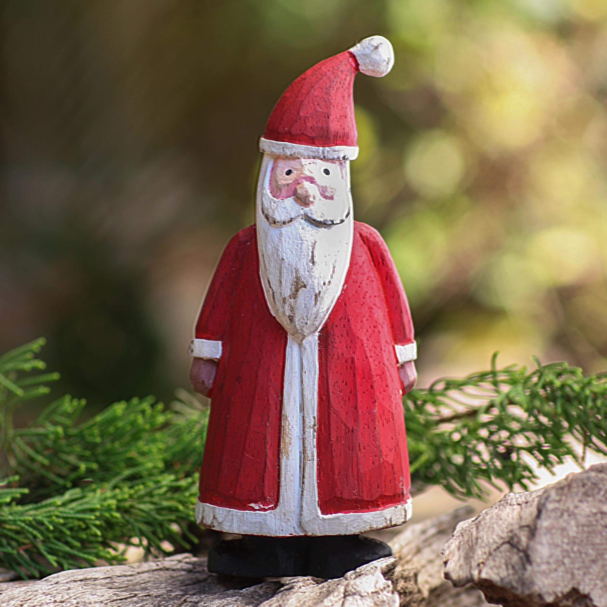 Rustic hand carved wooden santa claus