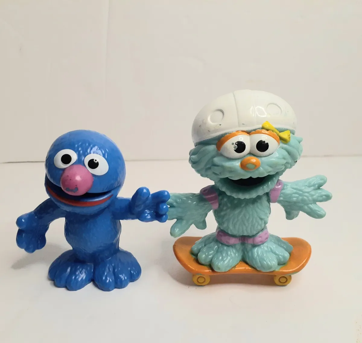 Sesame street workshop rosita skateboarding and grover tall pvc figures