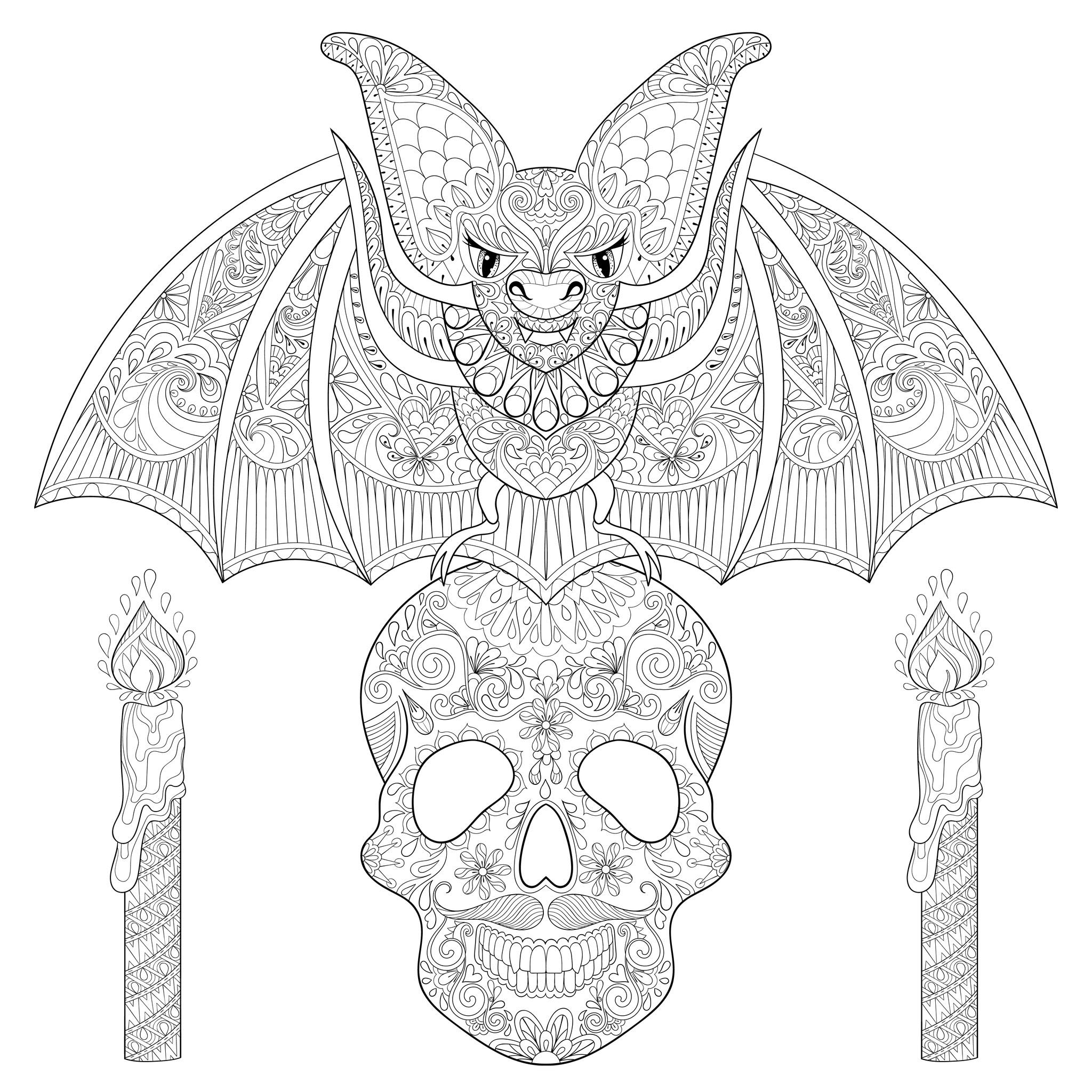 Bat on a skull with candles