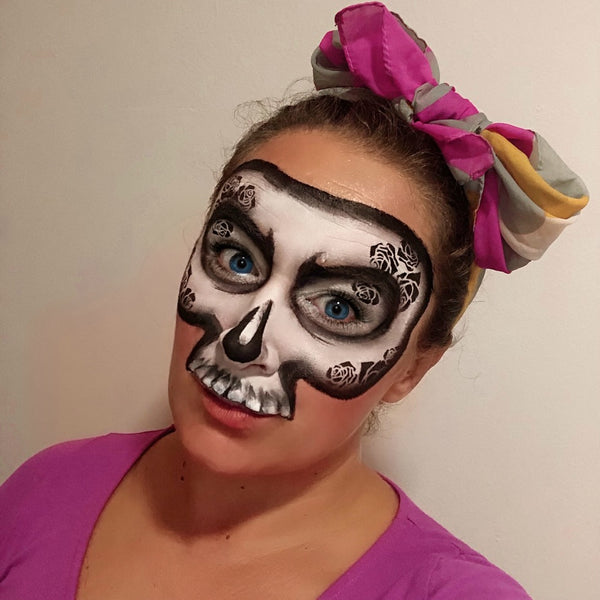 Simple rose skull face paint design by marina